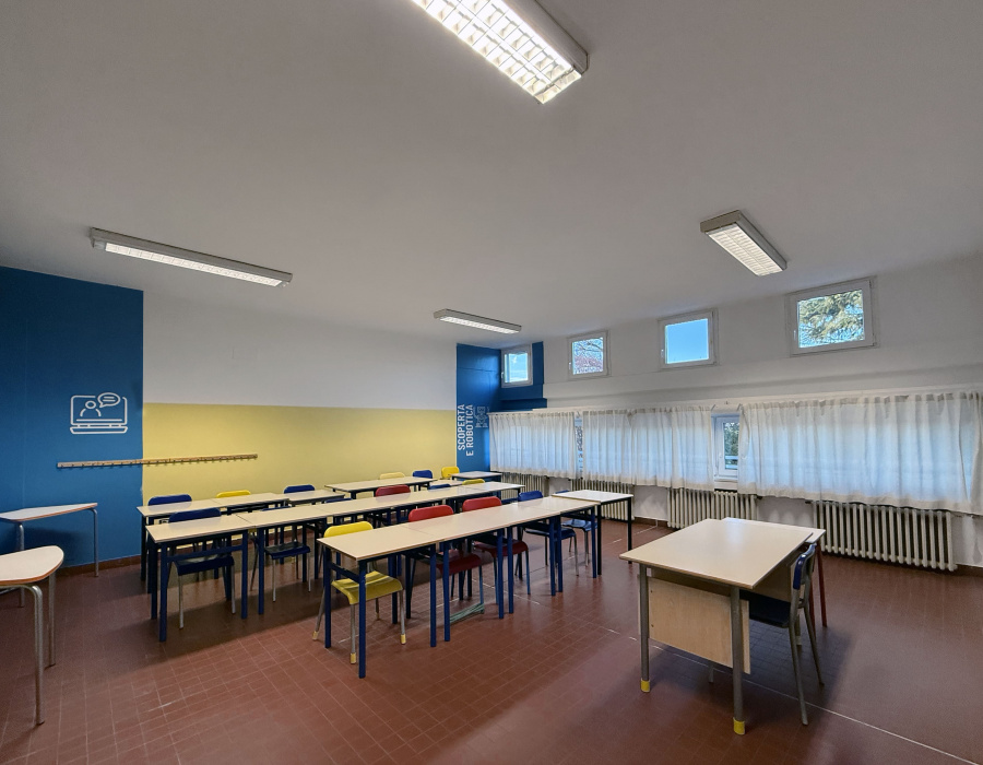 Dettaglio parete rivestita con pittura tecnica Isoplast Isocolor, superficie continua resistente a urti e lavaggi